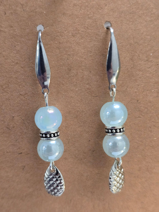 Light blue dangle earrings with spinners spoon
